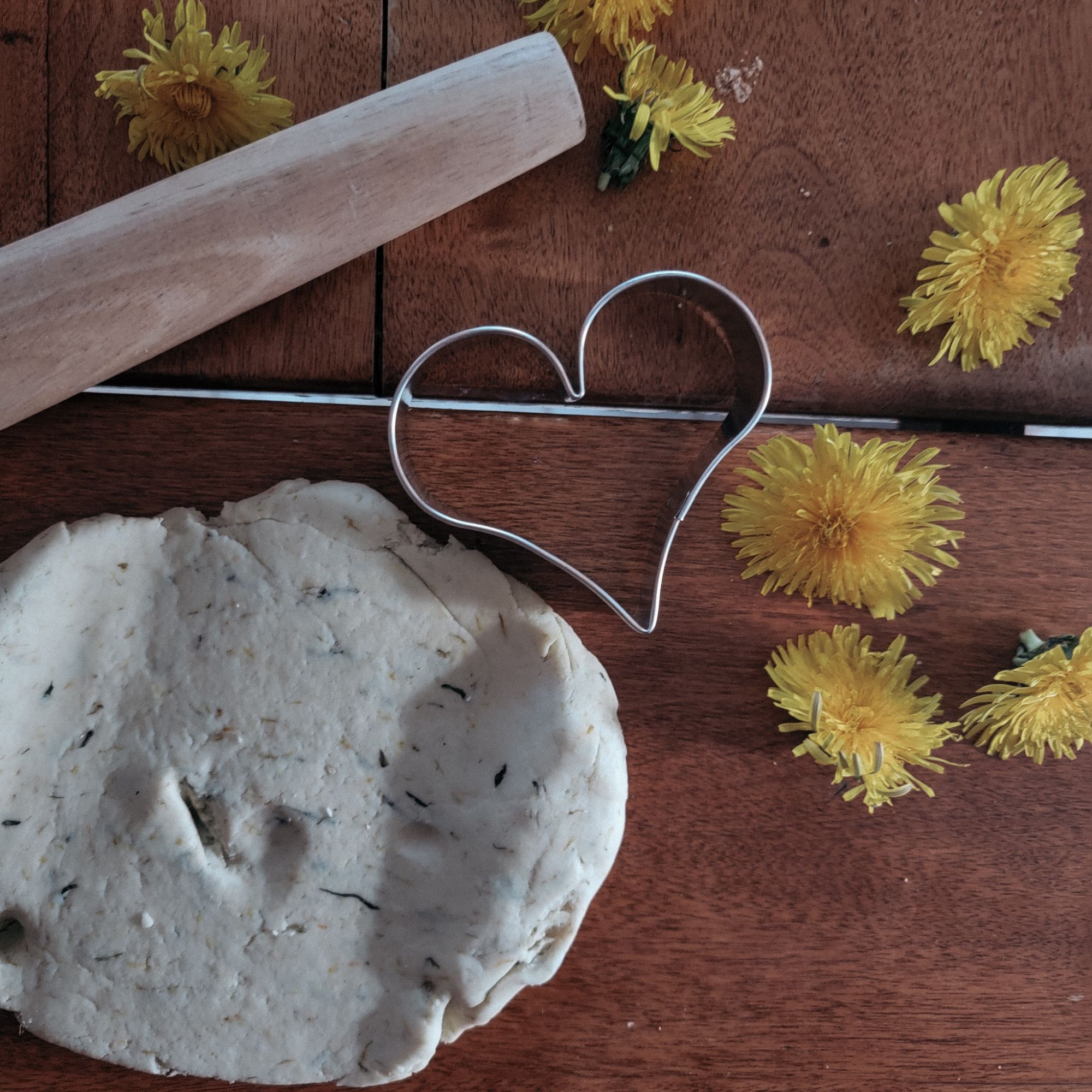 homemade dandelion playdough with playdough tools